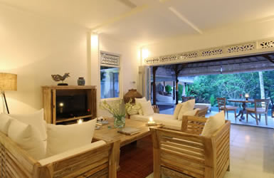 Tropical open plan living room